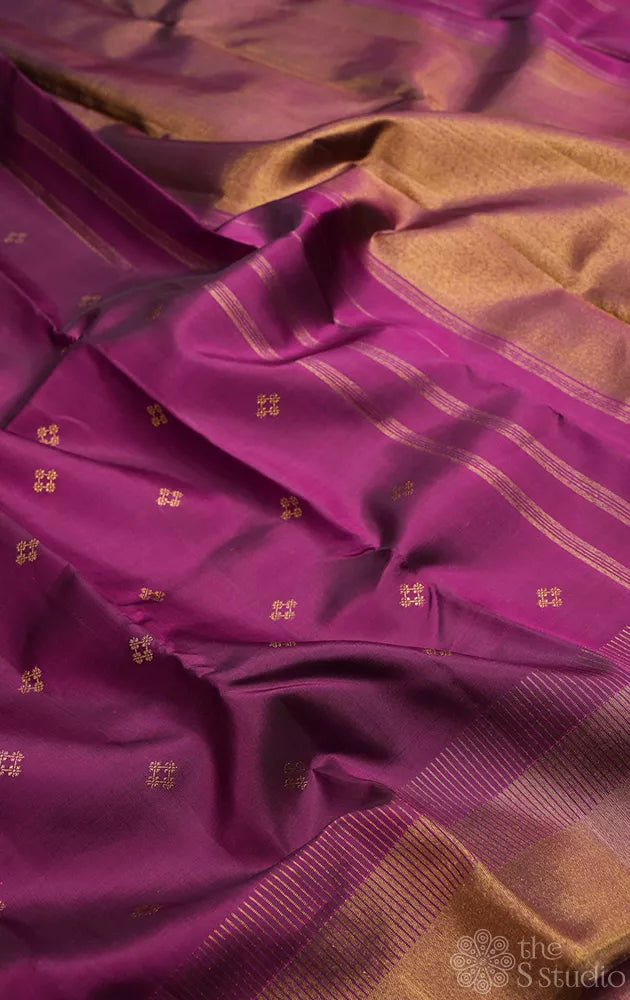 Purple kanjivaram silk saree with buttas and seepu reku border