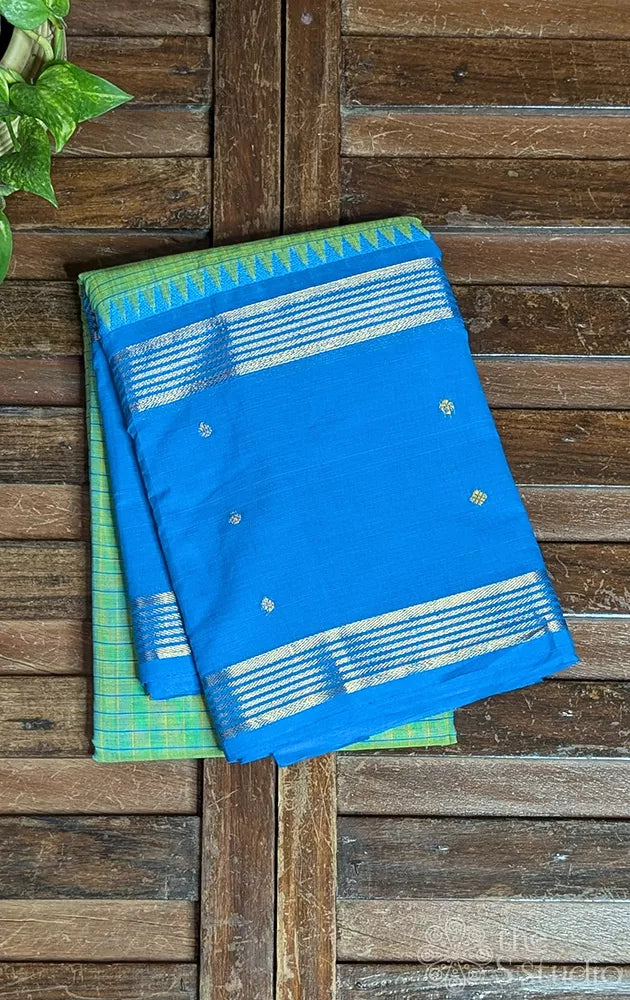 Light green checked kanchi cotton saree with blue rettaipet border