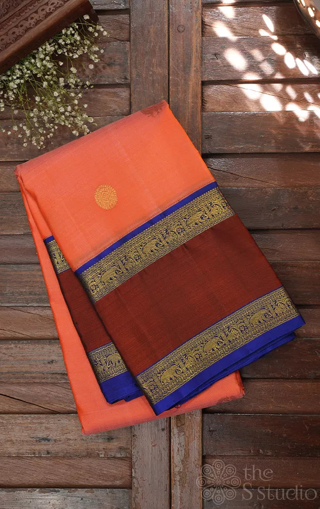 Orangish peach kanjivaram silk saree with korvai rettaipet border