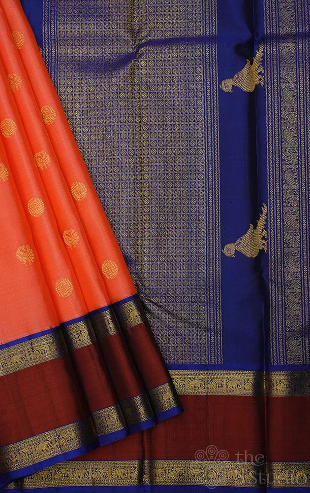 Orangish peach kanjivaram silk saree with korvai rettaipet border
