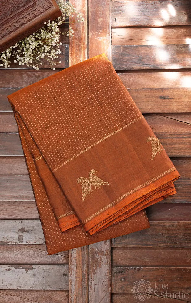Honey rust kanjivaram silk saree with vertical zari lines