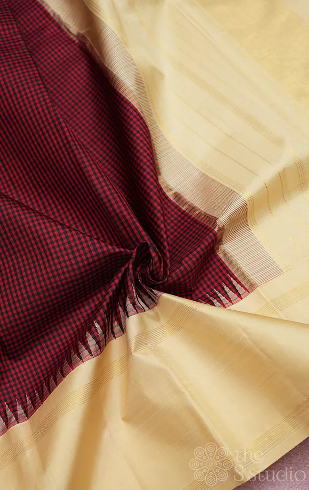Maroon and black small kattam kanchipuram silk saree with cream korvai border