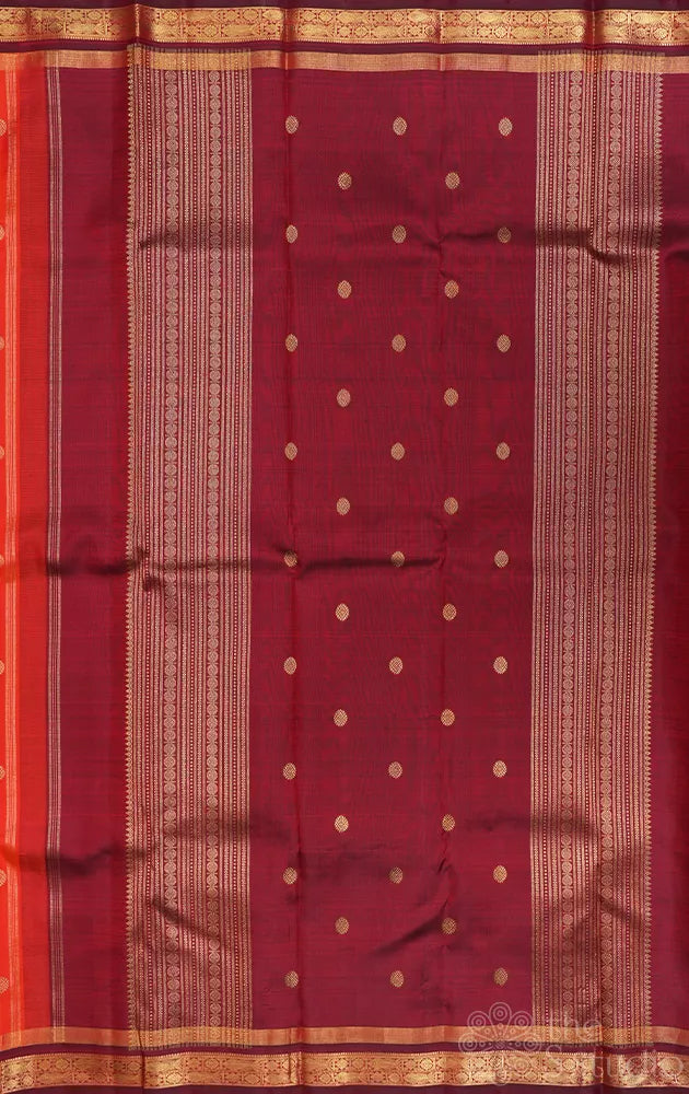 Bright orange kanjivaram silk saree with brown border