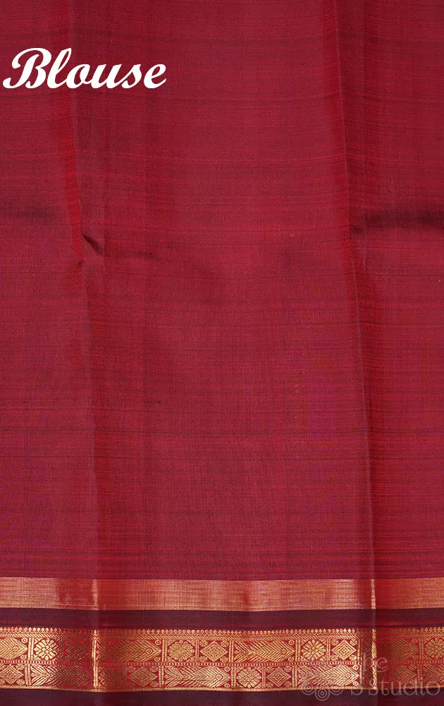 Bright orange kanjivaram silk saree with brown border