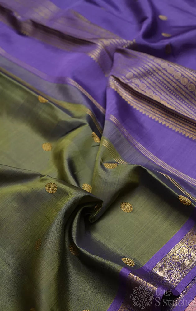 Olive green kanchi pattu saree with lavendar border and pallu