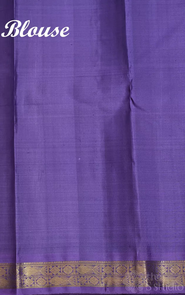 Olive green kanchi pattu saree with lavendar border and pallu