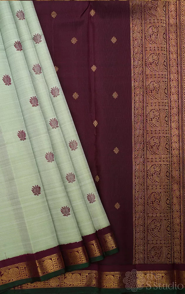 Pista green small border kanchi silk saree with korvai brown border