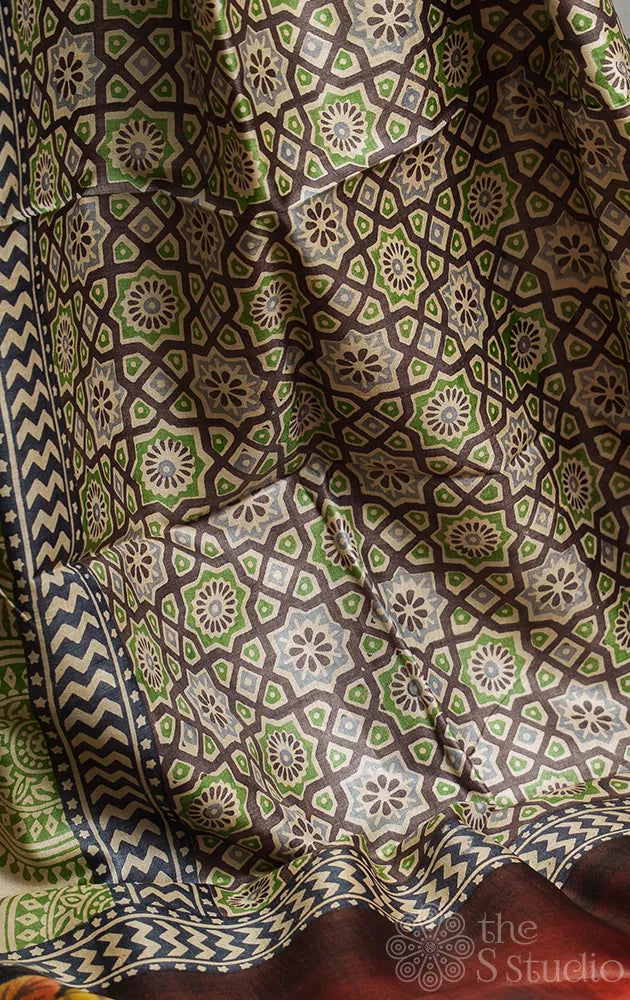 Beige colour ajrakh block printed tussar silk with hand painted pallu
