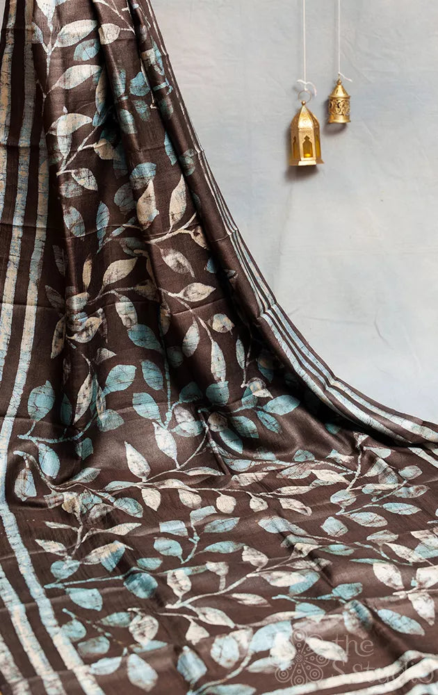 Dark brown tussar silk saree with light blue batik prints