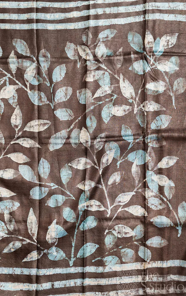Dark brown tussar silk saree with light blue batik prints