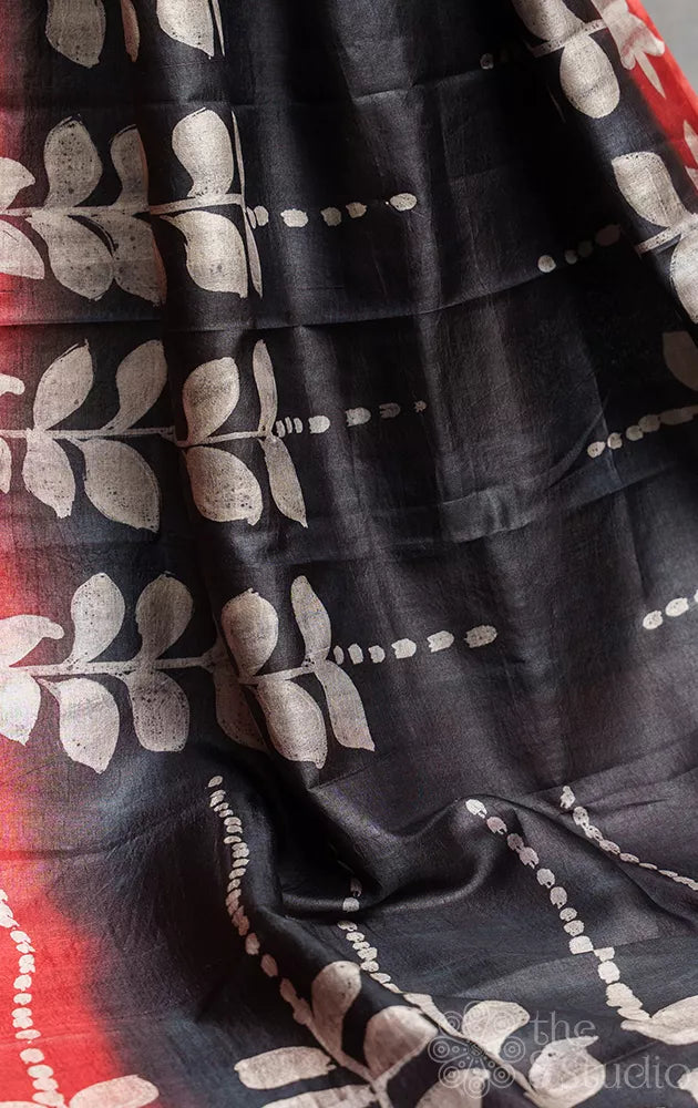Black tussar silk saree with red border and batik prints