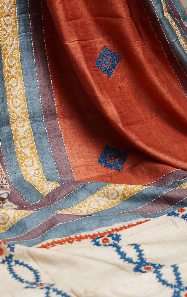 Brown hand batik printed pure tussar silk saree with hand embroidered border