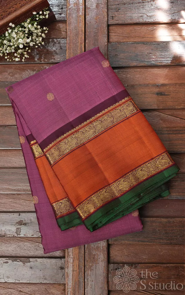 Pinkish lavender kanjivaram silk saree with rettaipet border