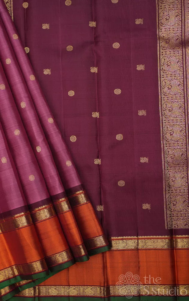 Pinkish lavender kanjivaram silk saree with rettaipet border