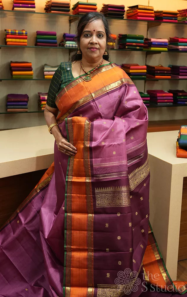 Pinkish lavender kanjivaram silk saree with rettaipet border