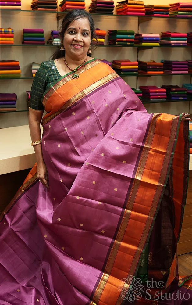 Pinkish lavender kanjivaram silk saree with rettaipet border