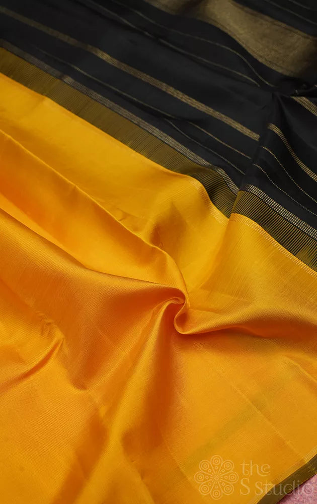 Plain Mustard yellow kanchi silk saree with black pallu