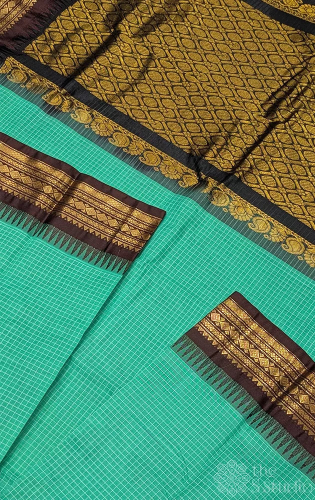 Rama blue gadwal cotton saree with checks and brown border