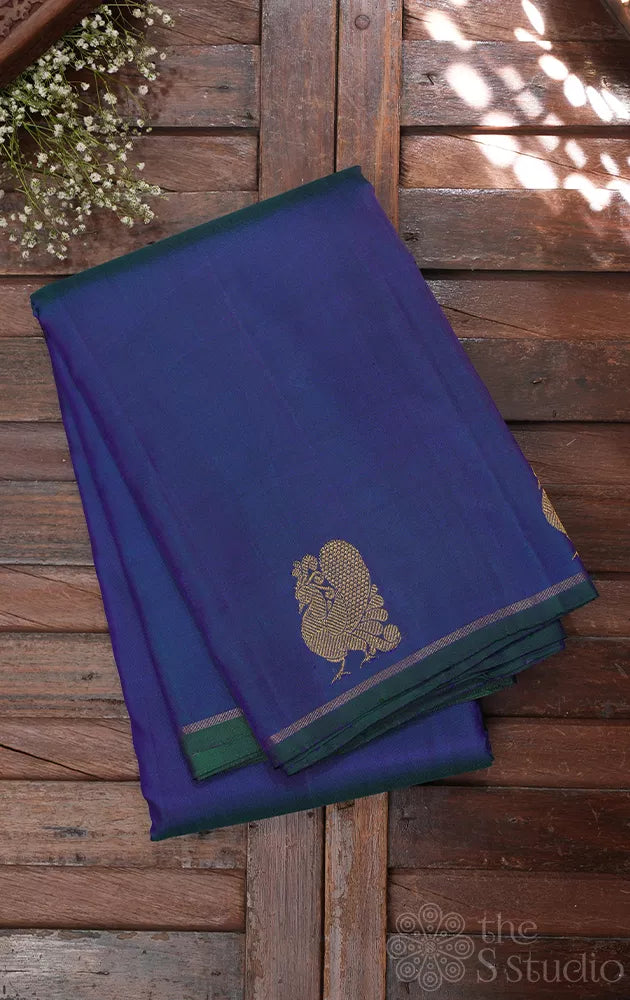 Peacock blue kanjivaram silk saree with border buttas