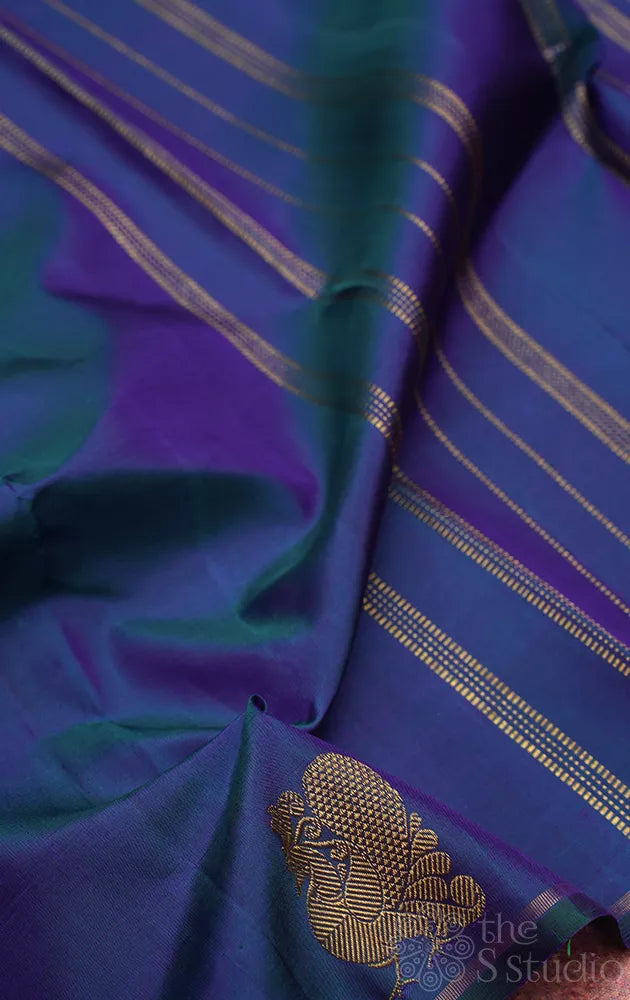 Peacock blue kanjivaram silk saree with border buttas