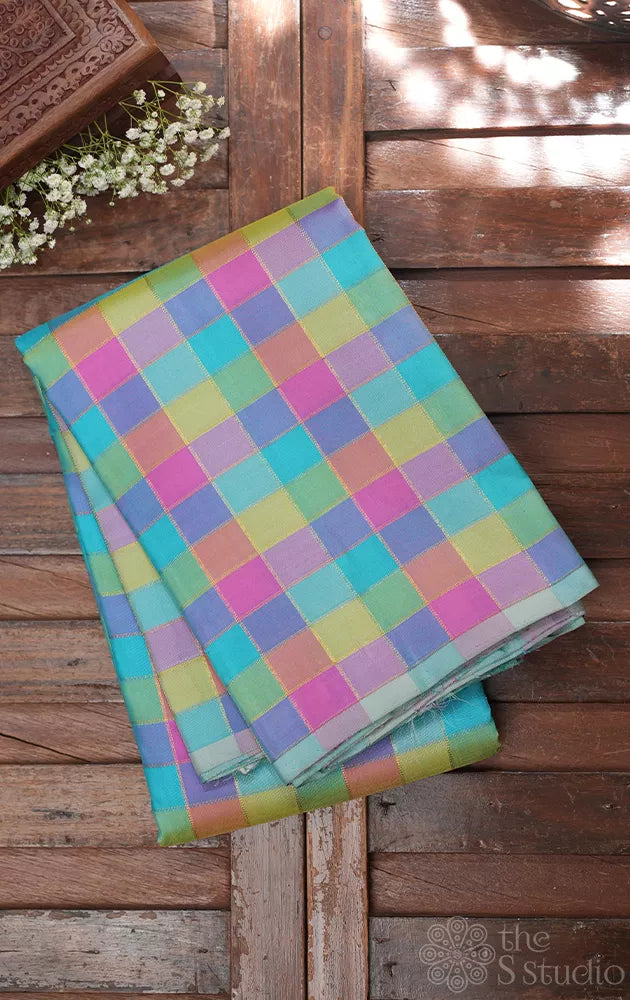 Pastel checked kanchipuram silk saree with pale blue pallu