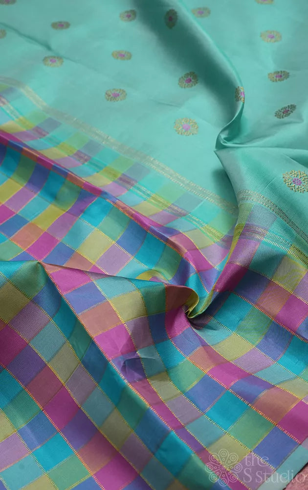 Pastel checked kanchipuram silk saree with pale blue pallu