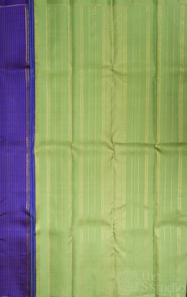 Violet borderless Kanchipuram silk saree with contrast elaichi green pallu