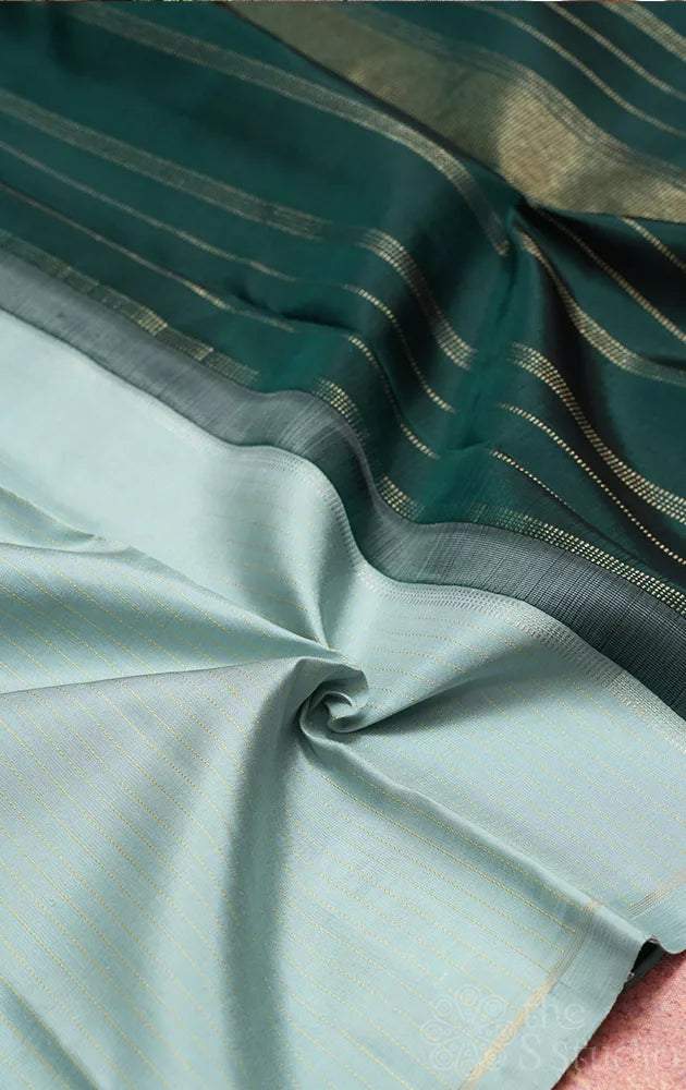 Powder blue borderless Kanchipuram silk saree with thread lines