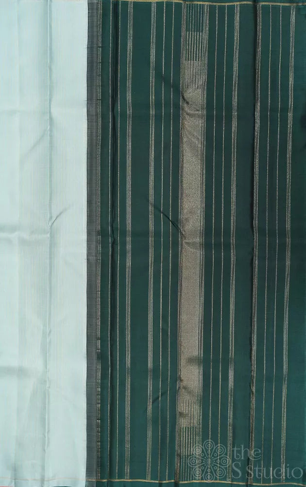 Powder blue borderless Kanchipuram silk saree with thread lines