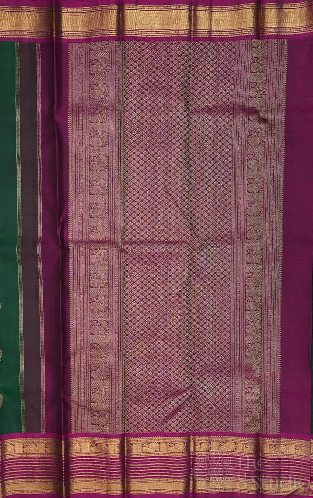 Bottle green kanjivaram silk saree with magenta border