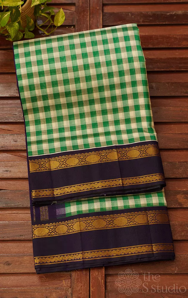 Green and white handloom checked silk cotton saree with korvai rettaipet border