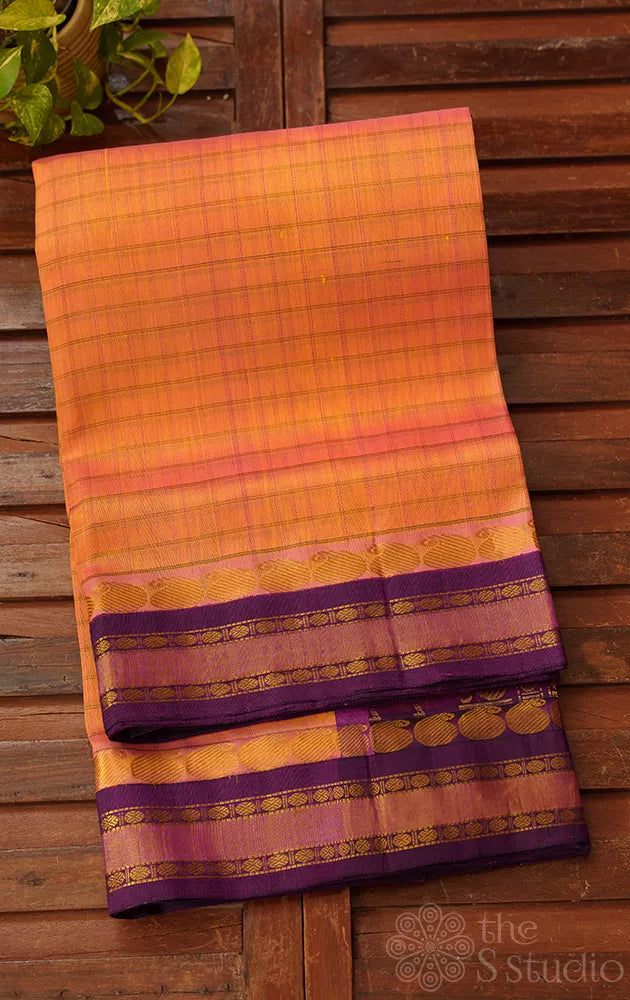 Peachish yellow dual tone  cotton silk saree with checks 