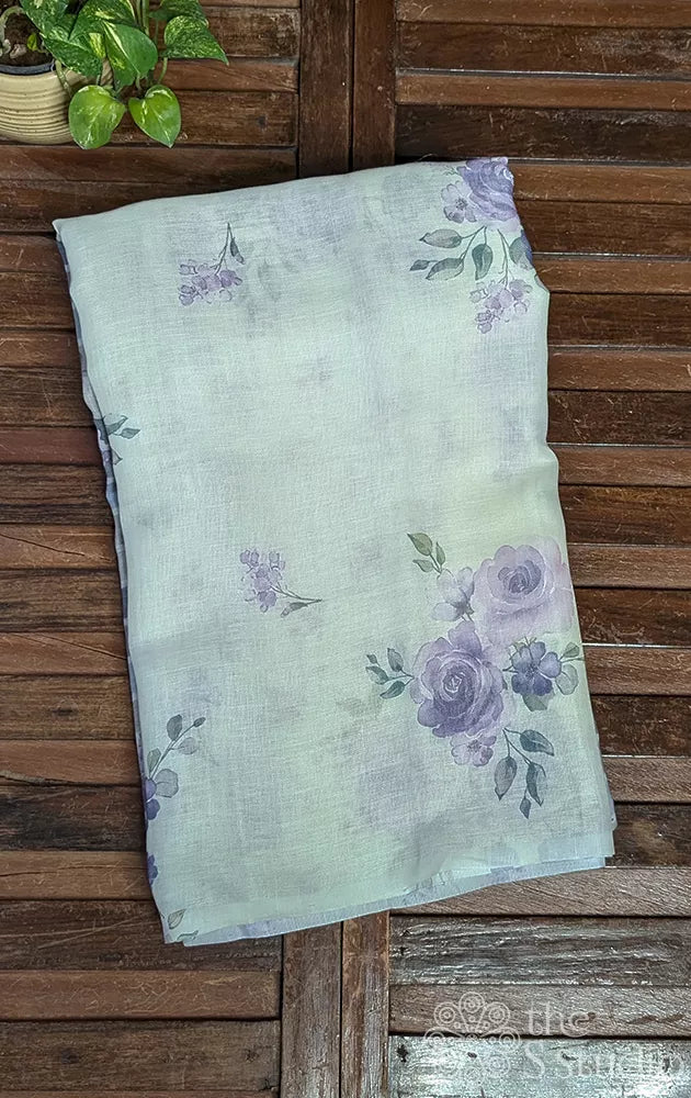 Off white linen saree with lavender floral prints 