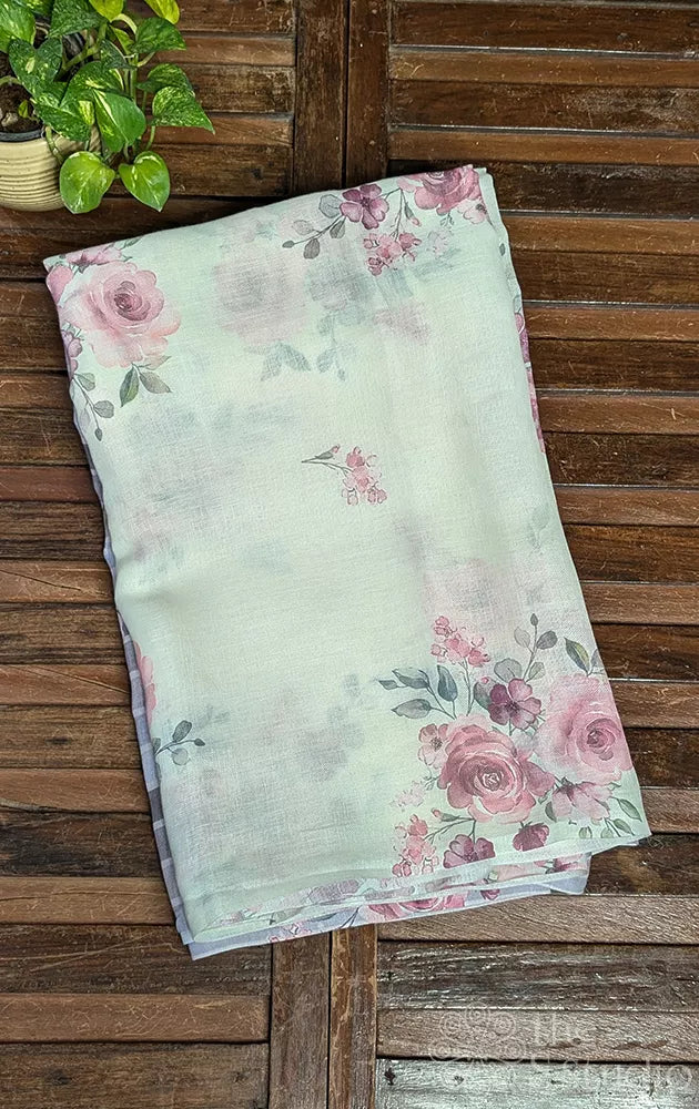 Off white linen saree with onion pink small floral prints