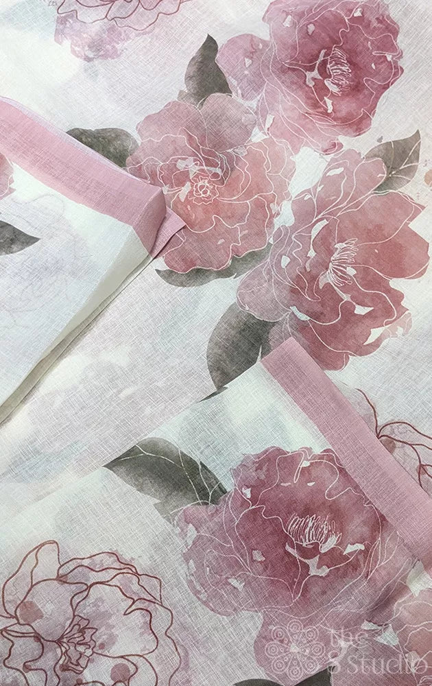 Off white linen saree with onion pink colour floral prints