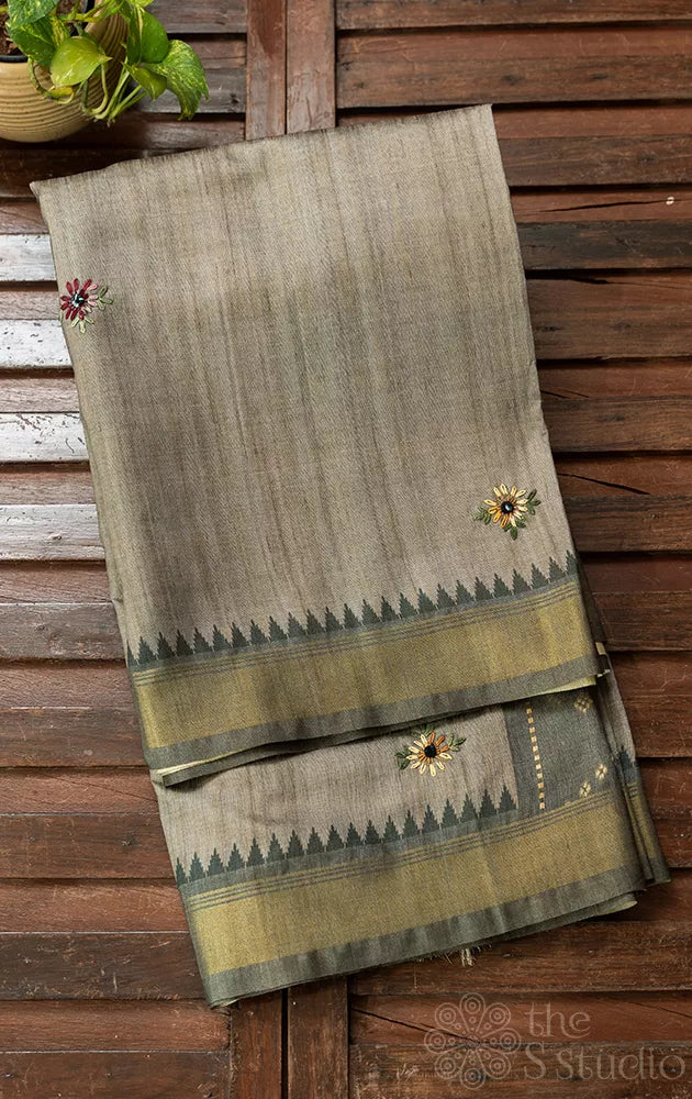 Greyish green semi tussar saree with woven threadwork floral buttas