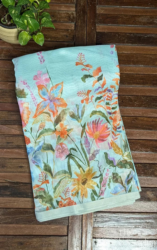 Light blue linen saree with floral & leaf prints