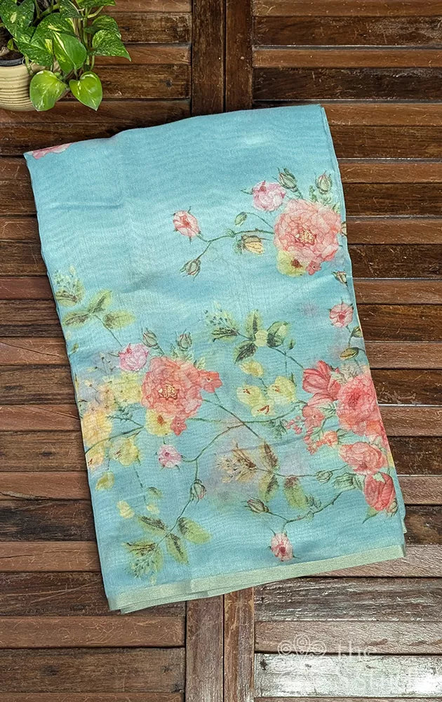 Light blue linen saree with floral creeper prints