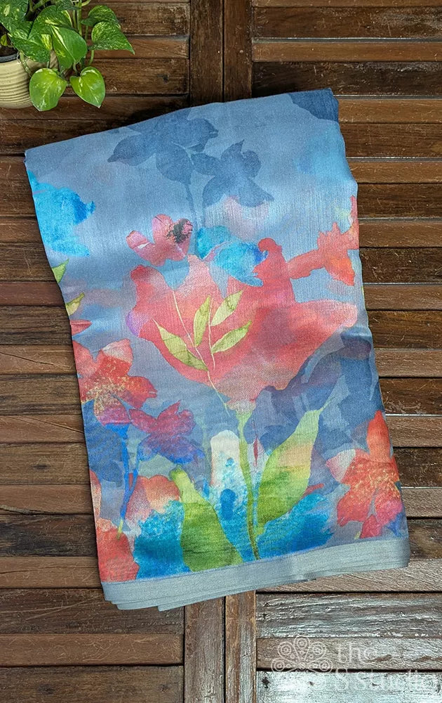 Blue linen saree with floral prints