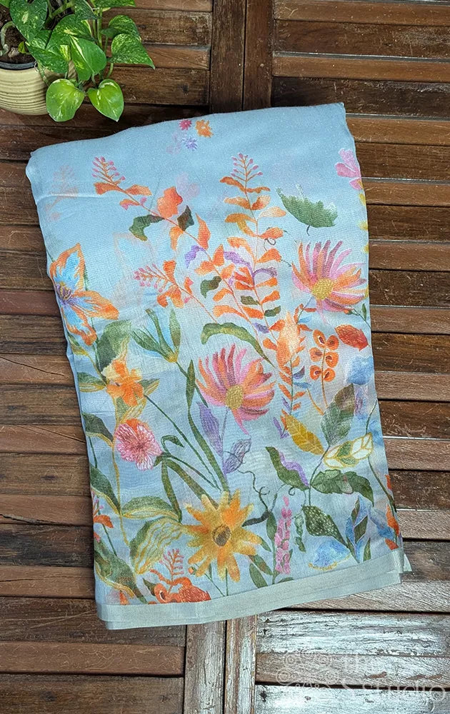 Blue linen saree with floral & leaf prints