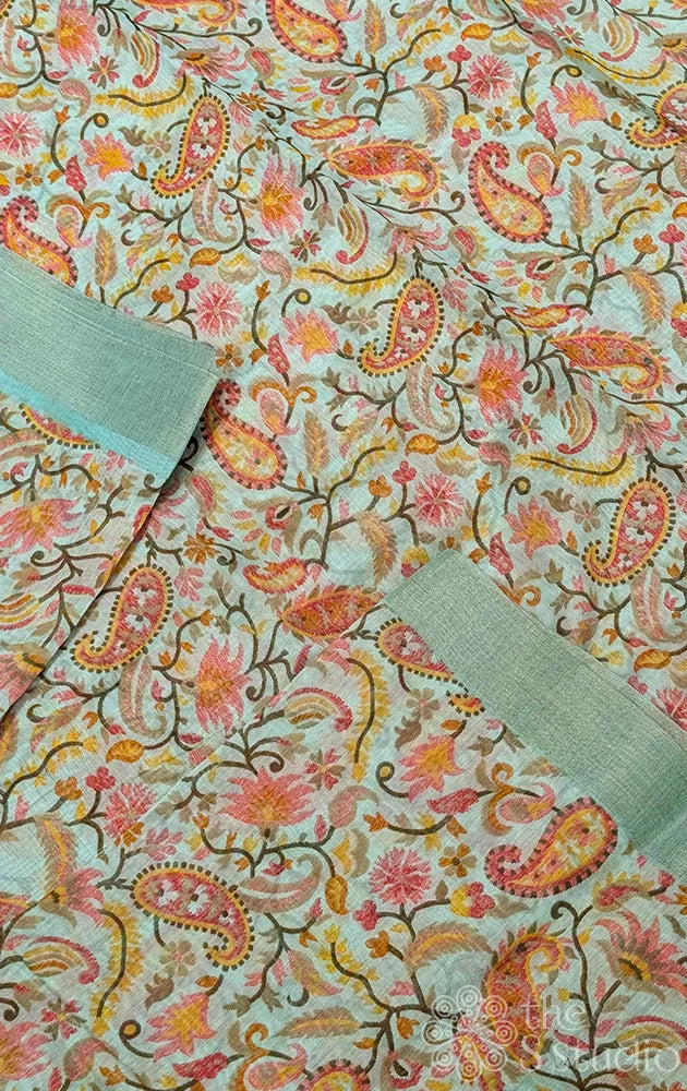 Sea green linen saree with paisley prints