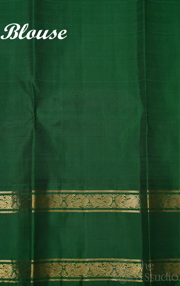 Mustard korvai kanjivaram silk saree with peacock blue and green border
