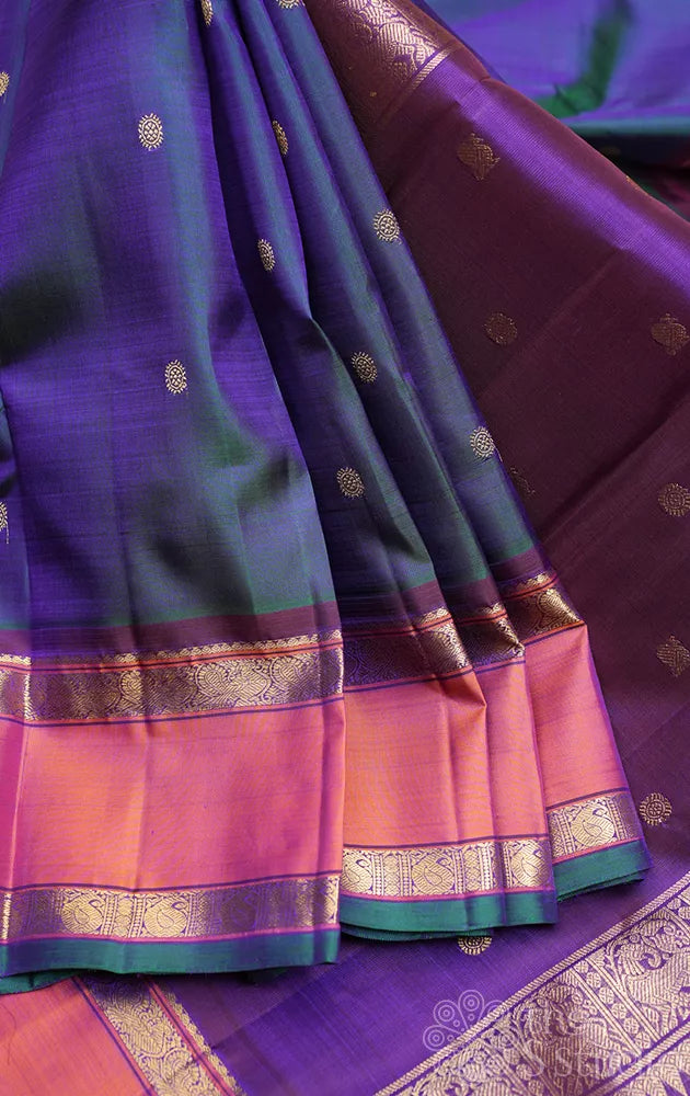 Peacock blue kanchipuram silk saree with rettaipet border