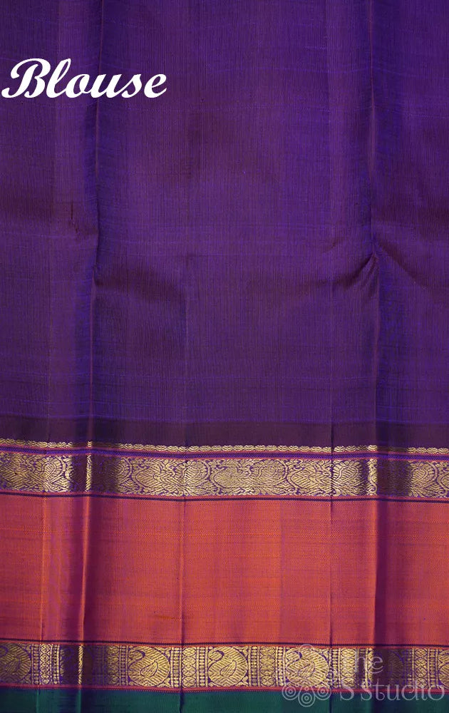 Peacock blue kanchipuram silk saree with rettaipet border