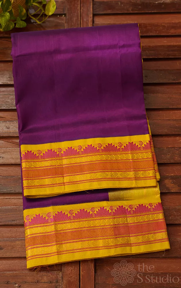 Violet silk cotton saree with yellow korvai border 
