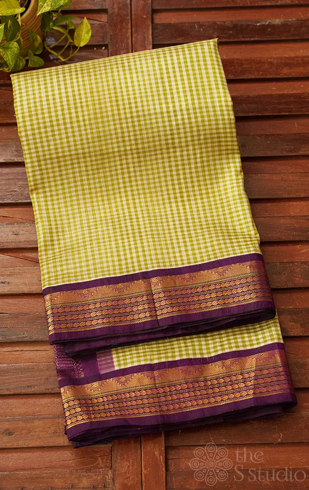 Light green checked handloom kanchipuram silk cotton saree with korvai zari border