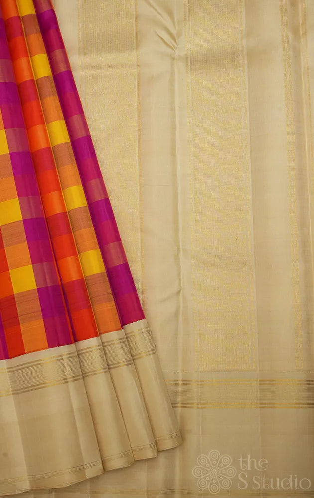 Red, yellow and orange checked kanchi silk saree with cream korvai border