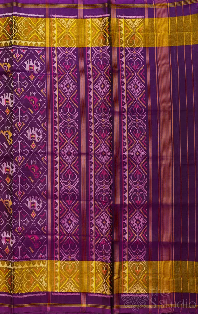 Purple rajkot patola saree with all over ikat design and tissue border