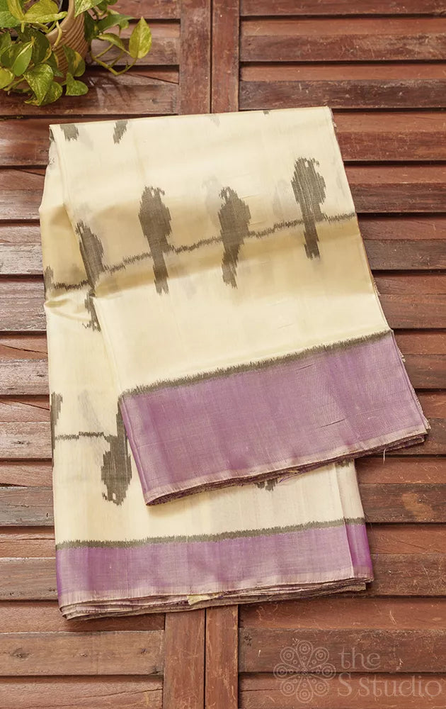 White patola saree with woven bird motifs