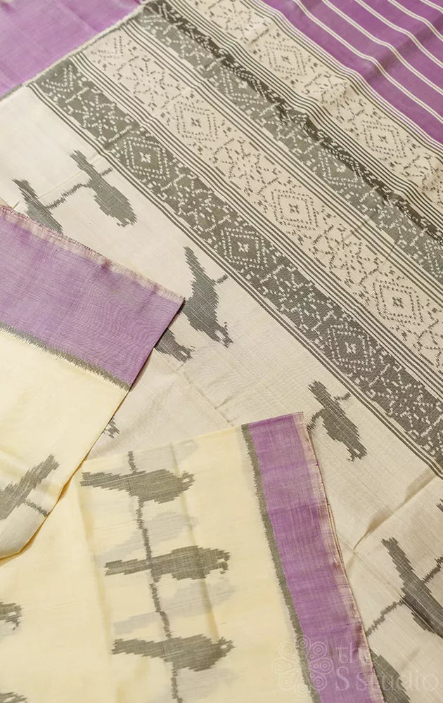 White patola saree with woven bird motifs